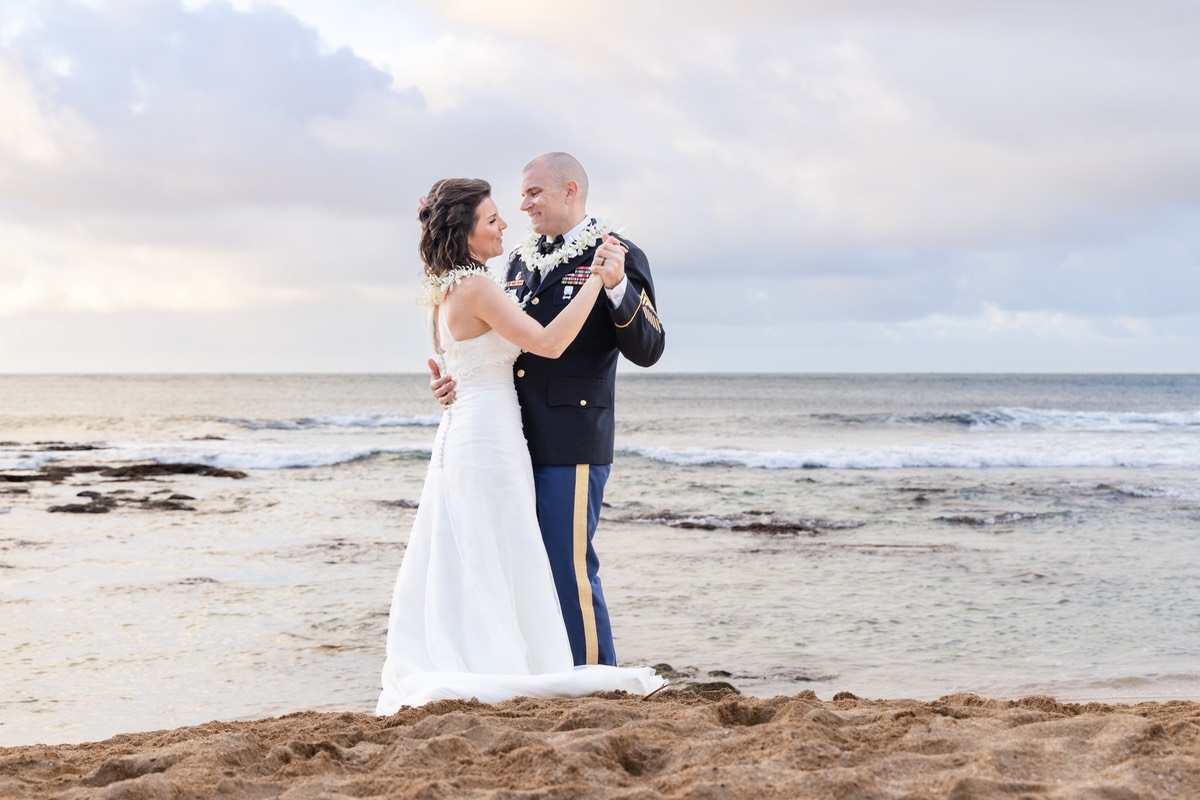 Decorated soldier's first dance on the beach by Kauai family photographer David Marsh