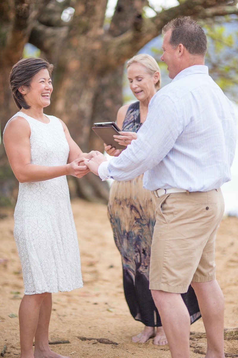 Frieda Gayle and wedding couple during ceremony 