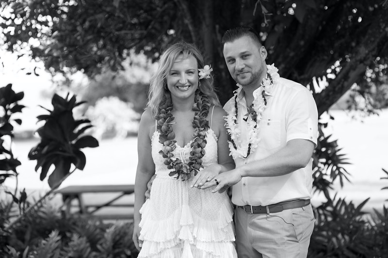 Kukuiloni Park wedding couple show off their rings.   BW