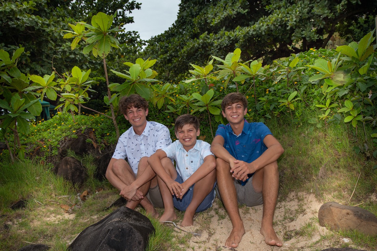 Three brothers at Princeville Resort Kauai. Photograph by David Fraser
